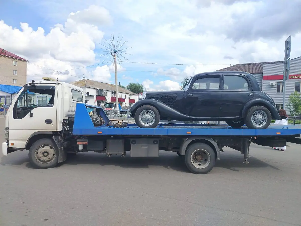 Автомобиль на эвакуаторе — перевозка по Кургану